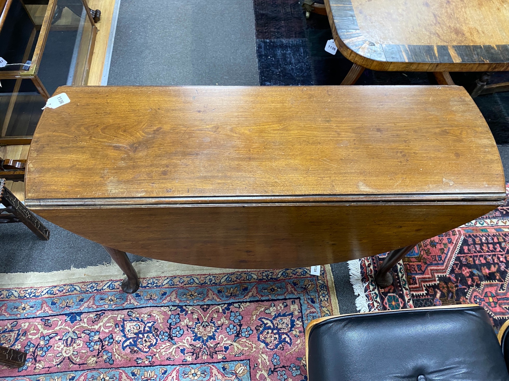 A George III mahogany dropleaf table with pad feet, width 114cm